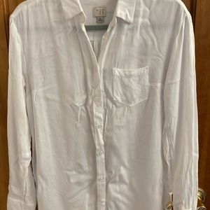 White button-down shirt.